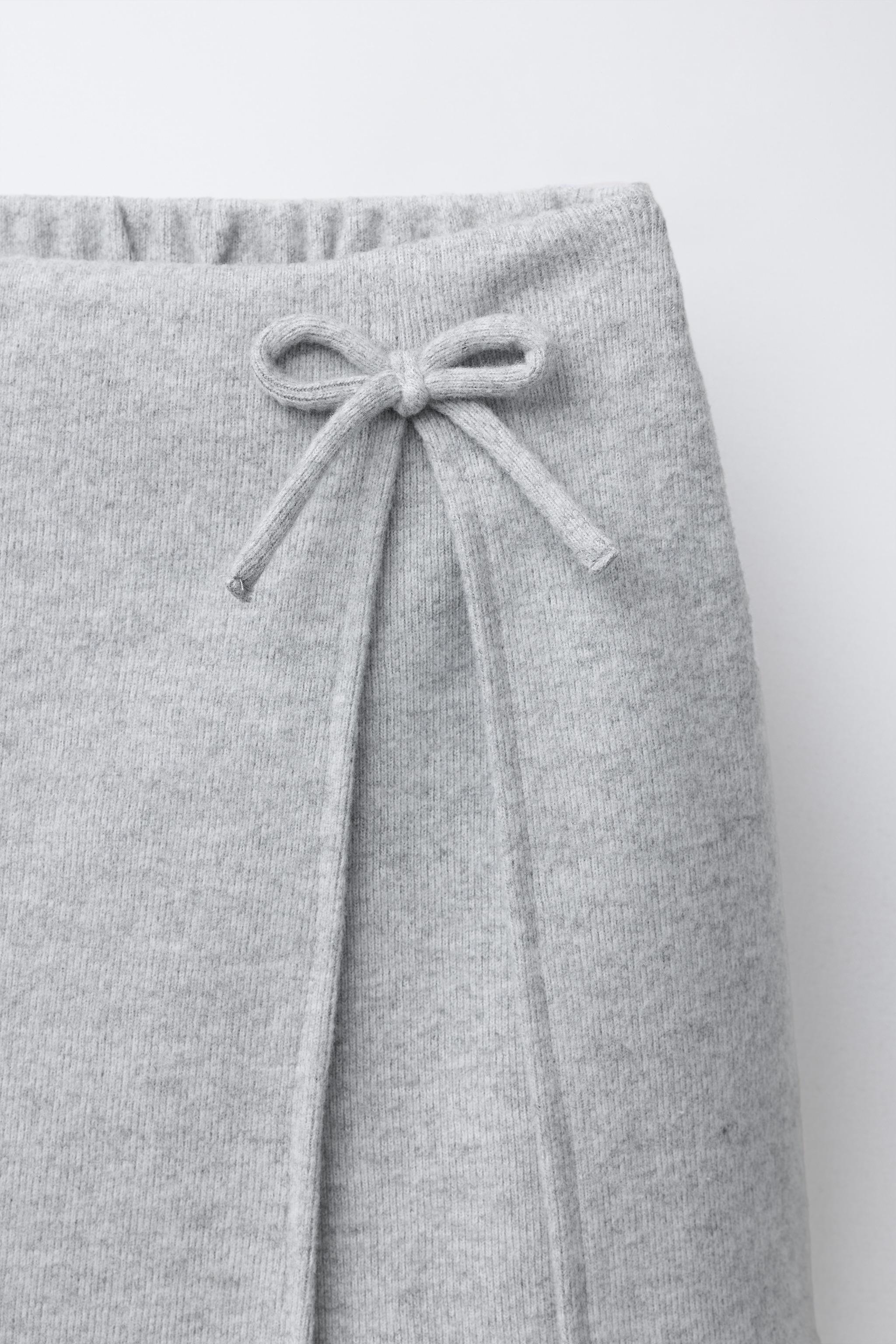 JUPE-SHORT DOUX AU TOUCHER AVEC NŒUD